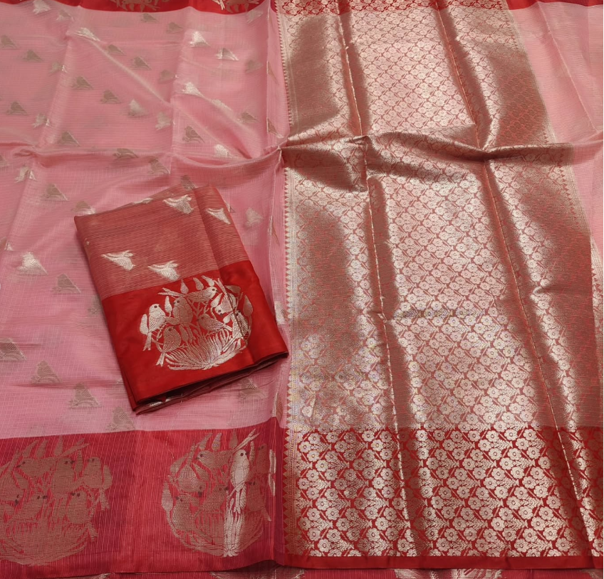Pink and red saree with intricate patterns